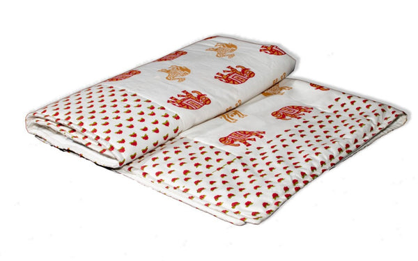 The hand blocked motifs on this soft white coloured, new born baby quilt is the dreamiest crib blanket for your baby. It is made with a lot of love, 100% pure cotton and is layered with a 150 GSM poly fibre filling. Made in India